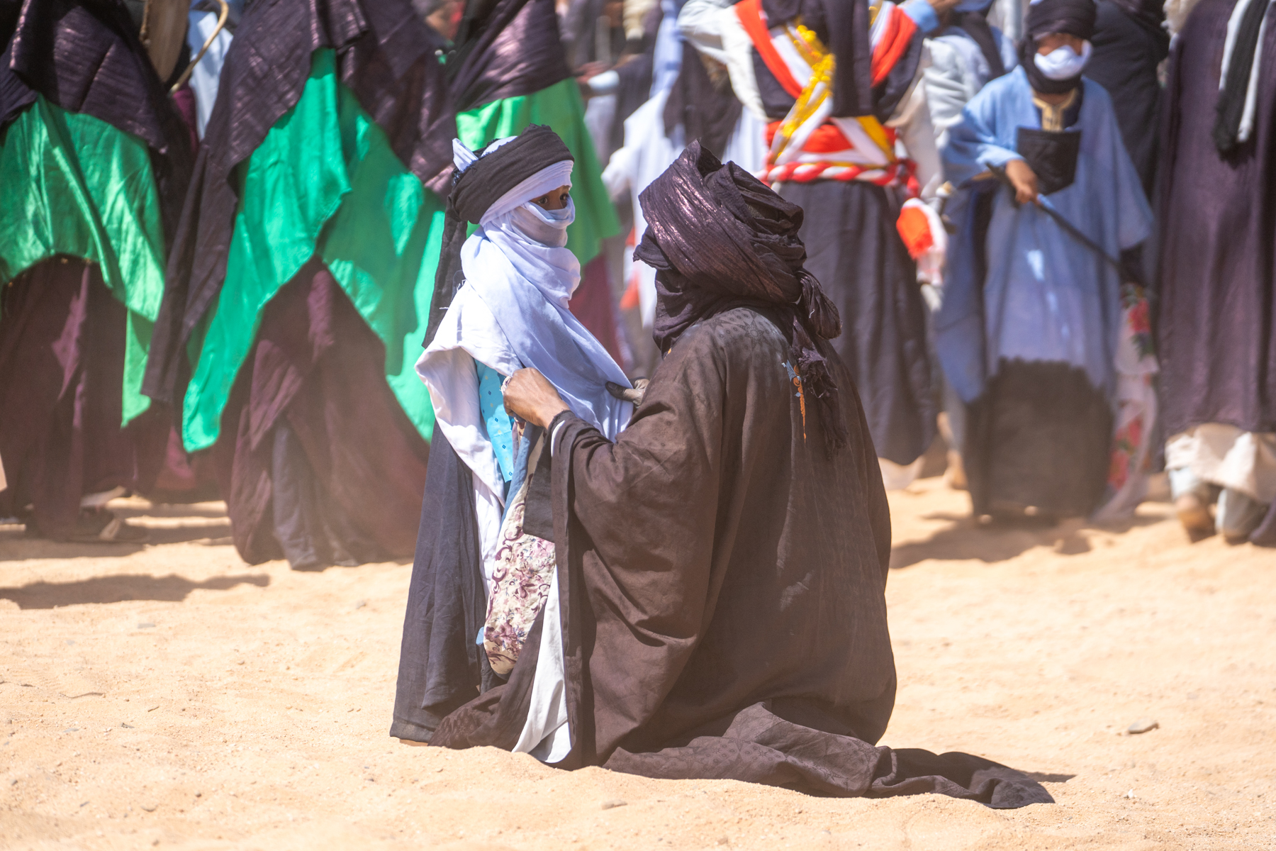 A Sabiba warrior preps his young son for the ceremony (image by Inger Vandyke)