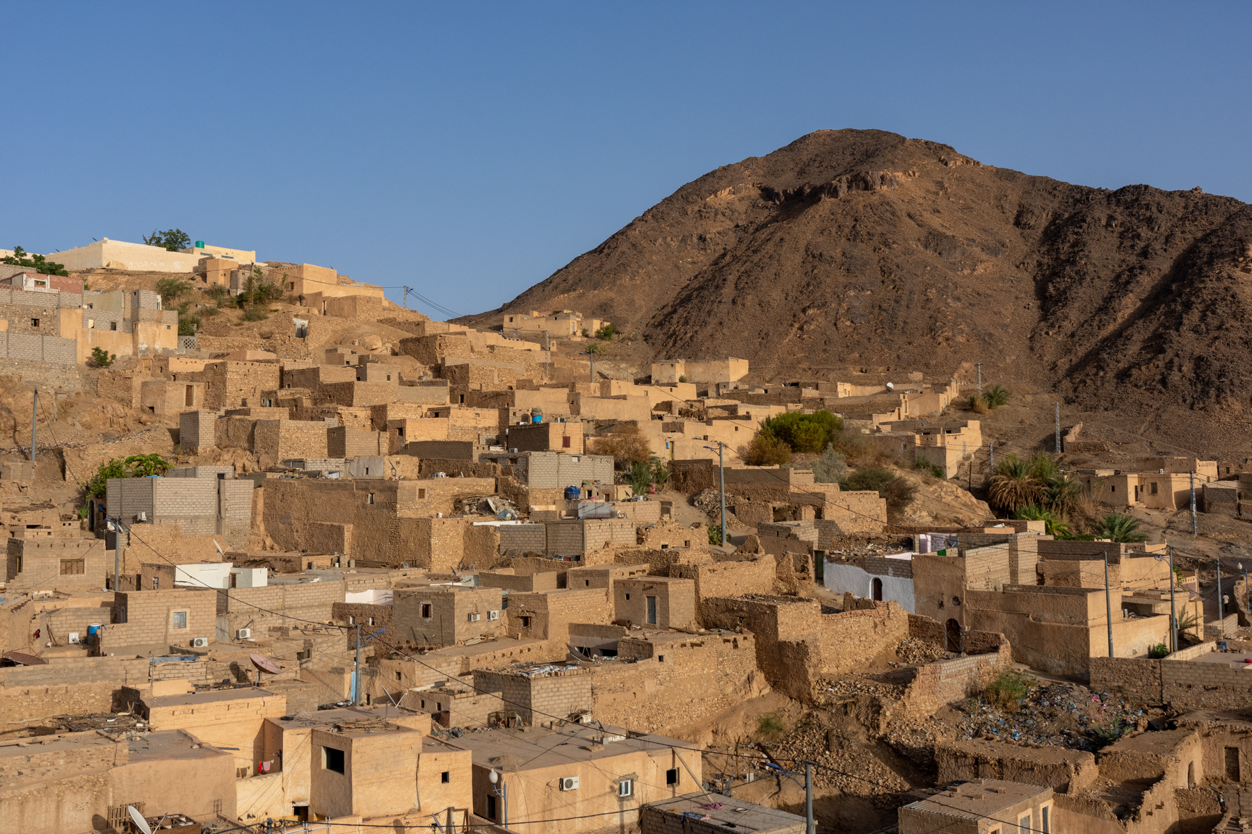 The newer buildings of Taghorfit are constructed over a neighbouring hillside to the Ksour of the same name (image by Inger Vandyke)