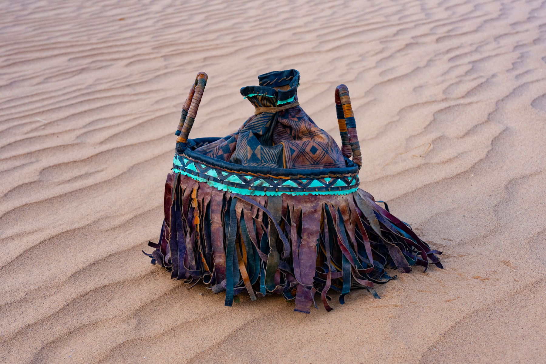 A traditional Tuareg leather tea making bag in the Sahara (image by Inger Vandyke)