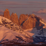 The furious violets and pinks of one Patagonian sunrise, that turned the Torres del Paine (towers) purple (image by Virginia Wilde)