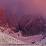 Sunrise turns the iconic Torres del Paine mountains a shade of pink (image by Virginia Wilde)