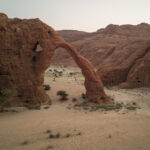 Elephant Arch with our guest walking the track at its base (image by Inger Vandyke)