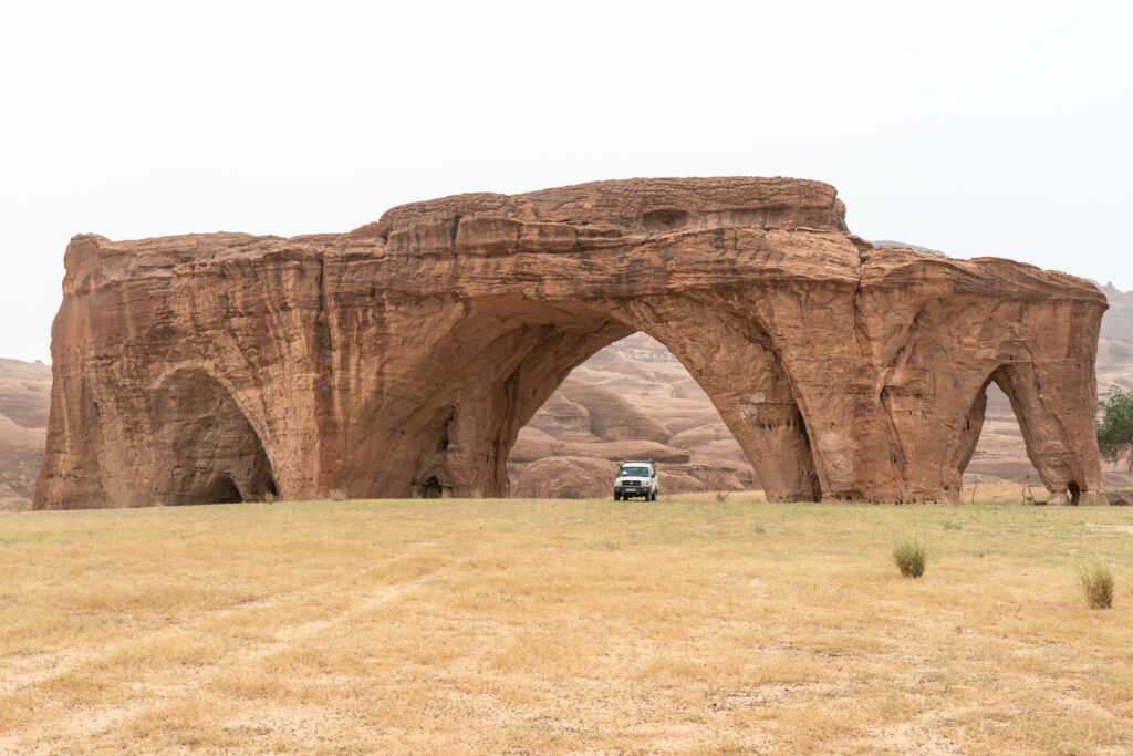 Driving through one of the arches of the Ennedi (image by Inger Vandyke)