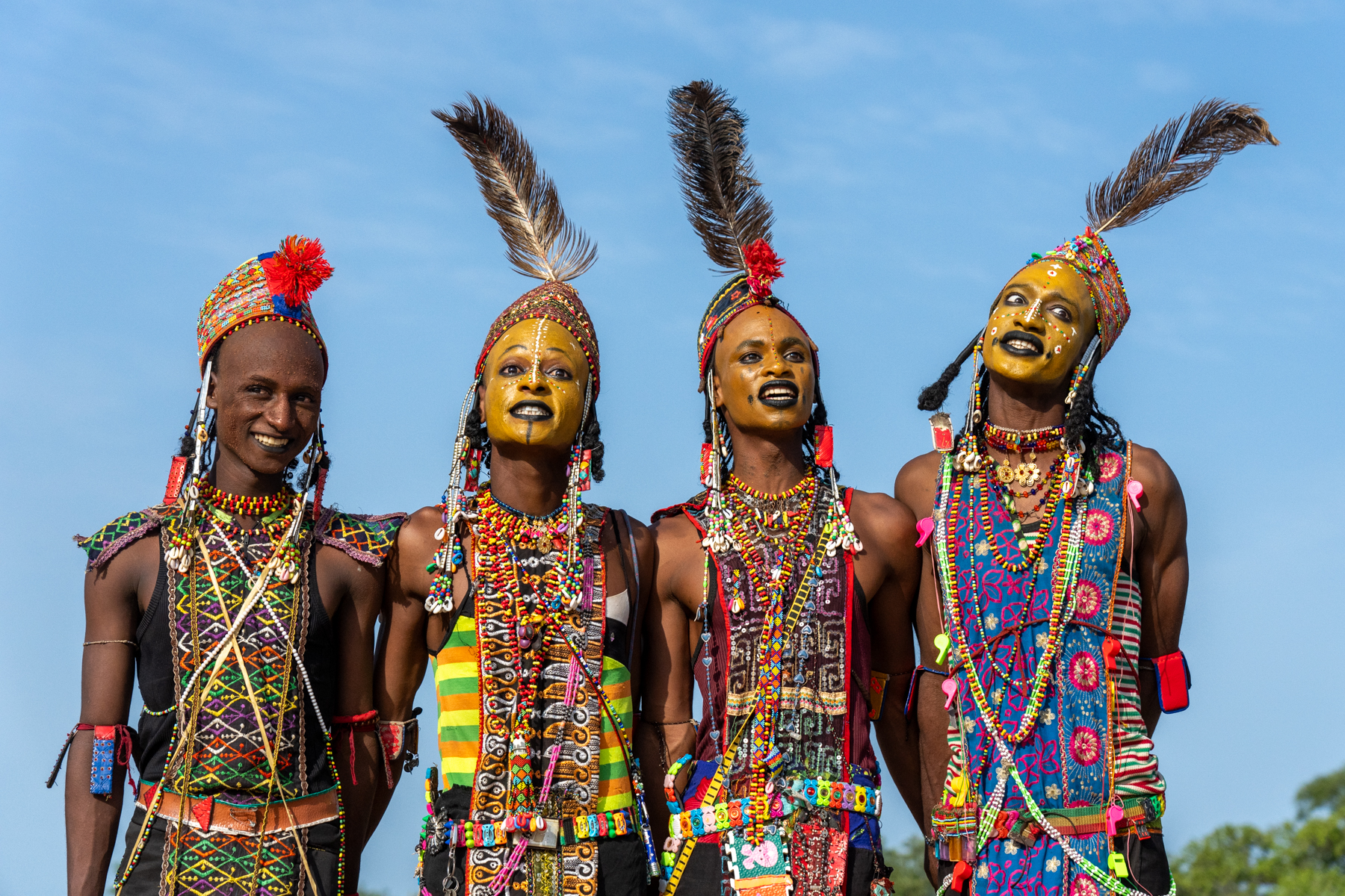 Young Wodaabe men singing at the Gerewol Festival. The only way to describe them is beautiful (image by Inger Vandyke)