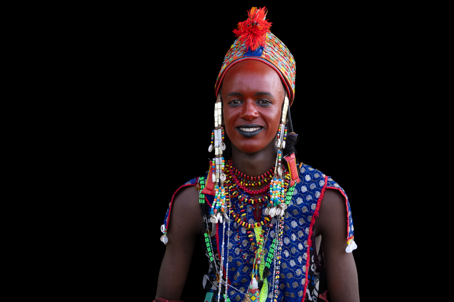 Smiling Wodaabe young man at the Gerewol (image by Inger Vandyke)
