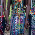 Detail of the beautiful ceremony tunics worn by young Wodaabe men at the Gerewol (image by Inger Vandyke)