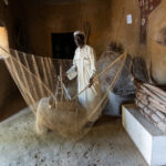 A Kotoko man demonstrating how men fish on the Chari river (image by Inger Vandyke)