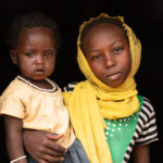 Portrait of a Toubou girl and her baby sister (image by Inger Vandyke)