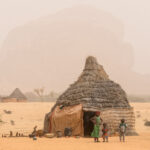 Toubou children outside their home in an Araï (dust storm) at Bachekele (image by Inger Vandyke)