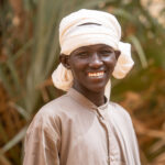 A smiling Toubou boy at Bachekele (image by Inger Vandyke)