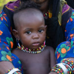 Wodaabe children are introduced to the spectacle of the Gerewol at a very young age (image by Inger Vandyke)