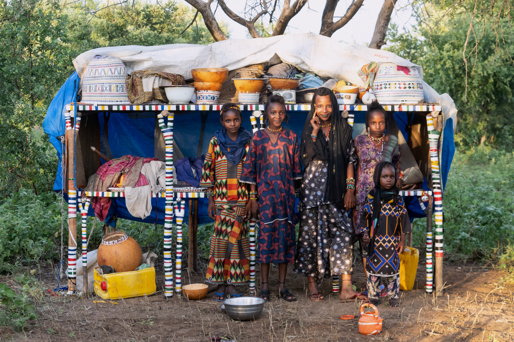 Young Wodaabe girls outside their Wuro (family home) in remote southern Chad (image by Inger Vandyke)