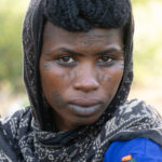 A beautiful Wodaabe girl with her facial tattoos and scarification (image by Inger Vandyke)