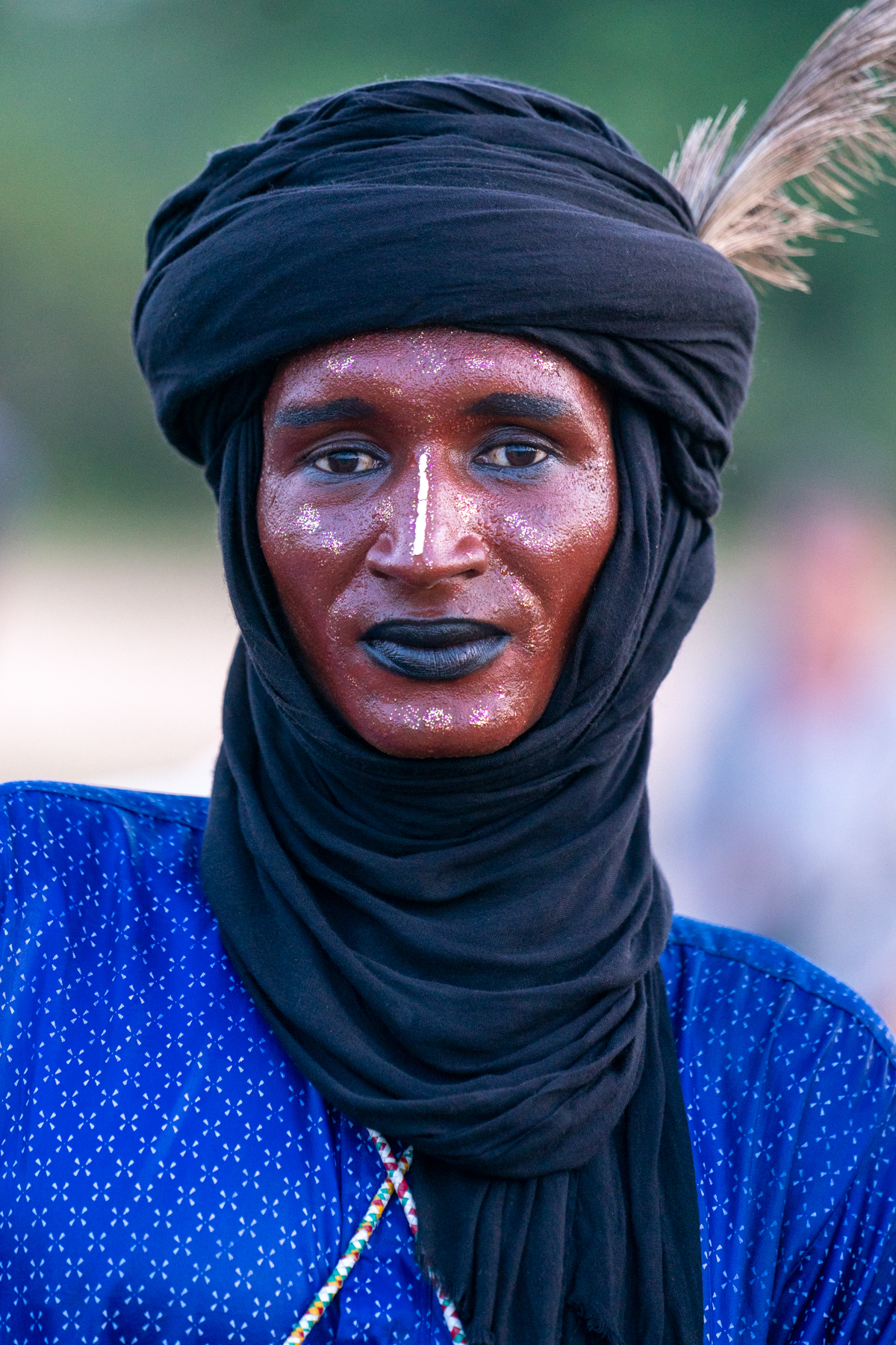 The Gerewol Festival attracts Wodaabe men from Chad and Nigeria in southern Chad. Portrait of a Nigerian Wodaabe who came to watch the dancing with us (image by Inger Vandyke)