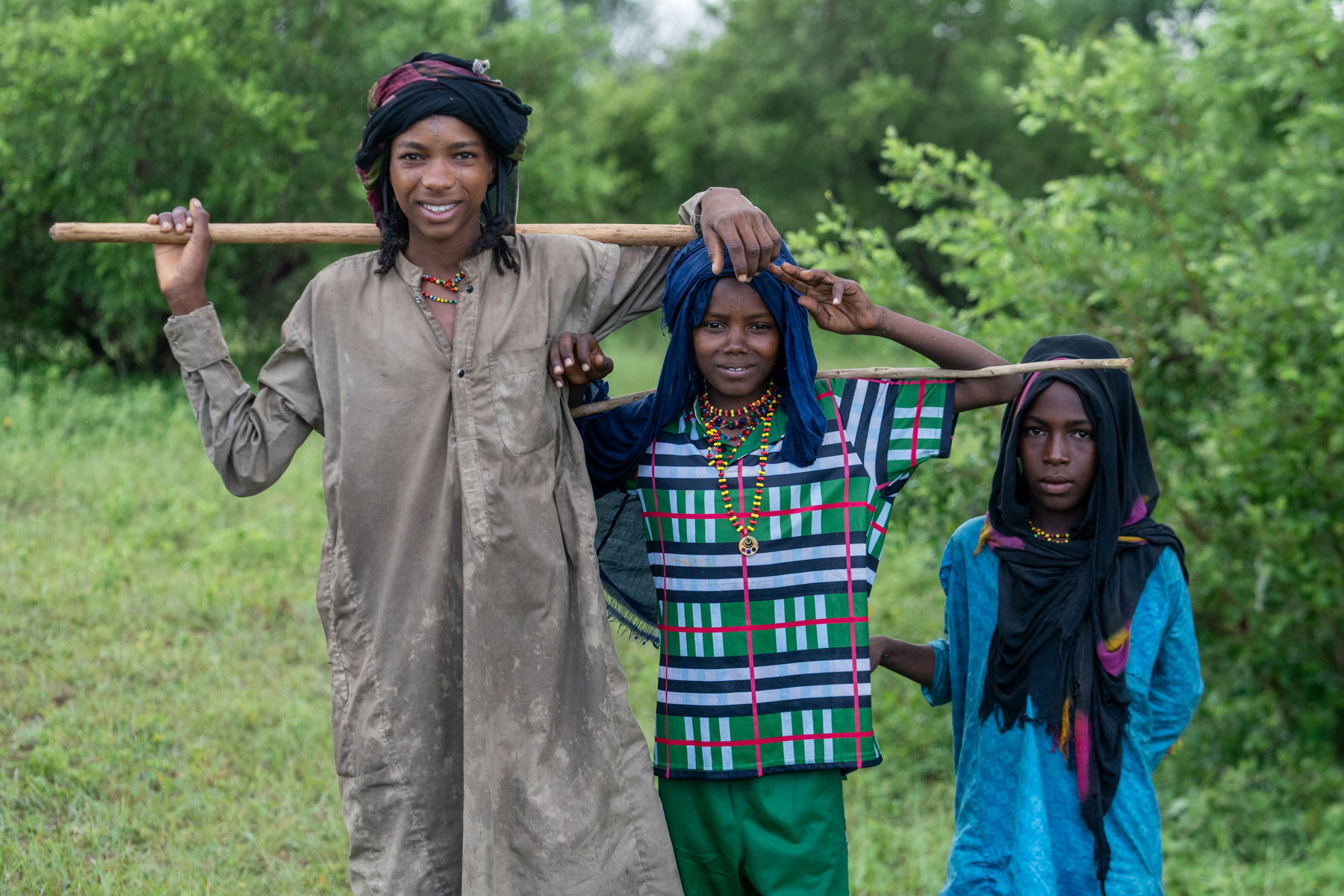 Young Wodaabe boys gather to watch young Wodaabe men prepare for the Gerewol, a time of much excitement for everyone (image by Inger Vandyke)