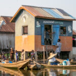 A visit to the hair dressers in Ganvie (image by Inger Vandyke)
