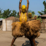 Stabbing while jumping is akin to rubbing your belly while tapping your head - difficult! But not so difficult for talented Koku dancers in Benin (image by Inger Vandyke)