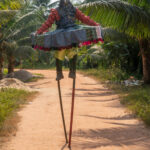 Kpodji Guegue stilt dancer entering the ceremony (image by Inger Vandyke)