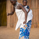 Beninese children start dancing even before they can walk. They learn their moves from their mothers (image by Inger Vandyke)