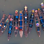 Queueing for fresh drinking water in Ganvie (image by Inger Vandyke)