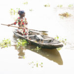 Tofinu children grow and thrive on the waters of Lake Nokoue in Benin (image by Inger Vandyke)