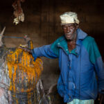 A rare invitation to photograph a Zangbeto chief inside his shrine. Going inside Zangbeto shrines is rarely allowed in Benin so this was a great honour (image by Inger Vandyke)