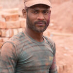Portrait of a brick carrier (image by Inger Vandyke)