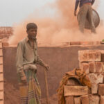 Brick workers toiling in tremendous amounts of dust (image by Inger Vandyke)