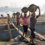 Coal carriers in Dhaka (image by Inger Vandyke)