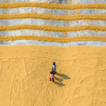 Going home after working in the rice drying area (image by Inger Vandyke)
