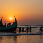 The mesmerising sunsets at Cox's Bazaar, where Moonboat fishermen prepare to go to sea (image by Inger Vandyke)