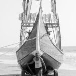 Landing a Moonboat on the beach (image by Inger Vandyke)