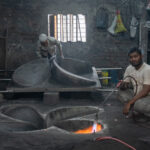 Making a new propeller out of metal that is recycled from broken ships (image by Inger Vandyke)