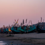 Moonboats glowing in the blush of dusk (image by Inger Vandyke)