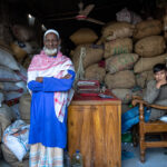Portrait of an old man inside a rice shop (image by Inger Vandyke)