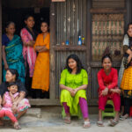 A beautifully colourful courtyard of women at a pottery making region (image by Inger Vandyke)