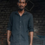 Ship worker inside a small foundry (image by Inger Vandyke)