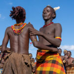 The father of the groom and mother of the bride celebrating Micha in Dassanech culture (image by Inger Vandyke)
