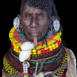 Elderly Turkana lady with her copper labret. Younger Turkana women have now abandoned this tradition of lip piercing and it is only seeing in elders (image by Inger Vandyke)