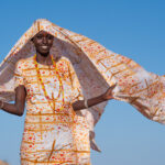 A stunning Gabra girl with her shawl flying in the breeze (image by Inger Vandyke)