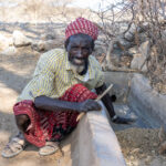 An elderly Gabra 'Dabartu' of the man who is tasked to clean a singing well ahead of the herders arriving to water their livestock (image by Inger Vandyke)