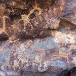Ancient giraffe petroglyphs near Lake Turkana. The Turkana hold giraffes sacred, believing their lofty heads tickle the clouds to make them rain (image by Inger Vandyke)