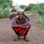 A decorated Pokot elder on his way to a ceremony in remote Western Kenya (image by Inger Vandyke)