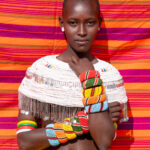 A beautiful Rendile girl against a Maasai shuka (image by Inger Vandyke)