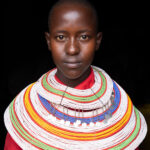 A young Samburu woman wearing her multi-coloured Sael necklaces (image by Inger Vandyke)