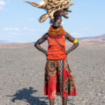 A Turkana woman with firewood (image by Inger Vandyke)