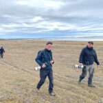 Wild Images photographers returning from a successful mission (image by Mike Watson)