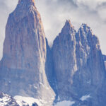 A condor passes the towers (image by Mike Watson)