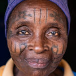 Portrait of a Holi woman with her beautifully tattooed face (image by Ingrid Koedood)