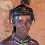 Portrait of an Ovahakaona woman with her feather headdress (image by Inger Vandyke)